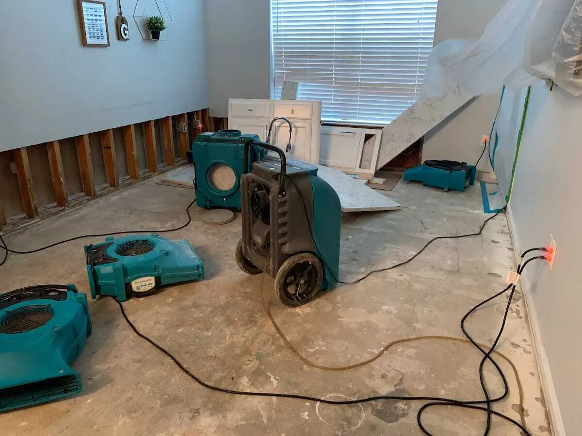 Dehumidifier in flood-cut room for Water Damage Restoration in Neptune Beach